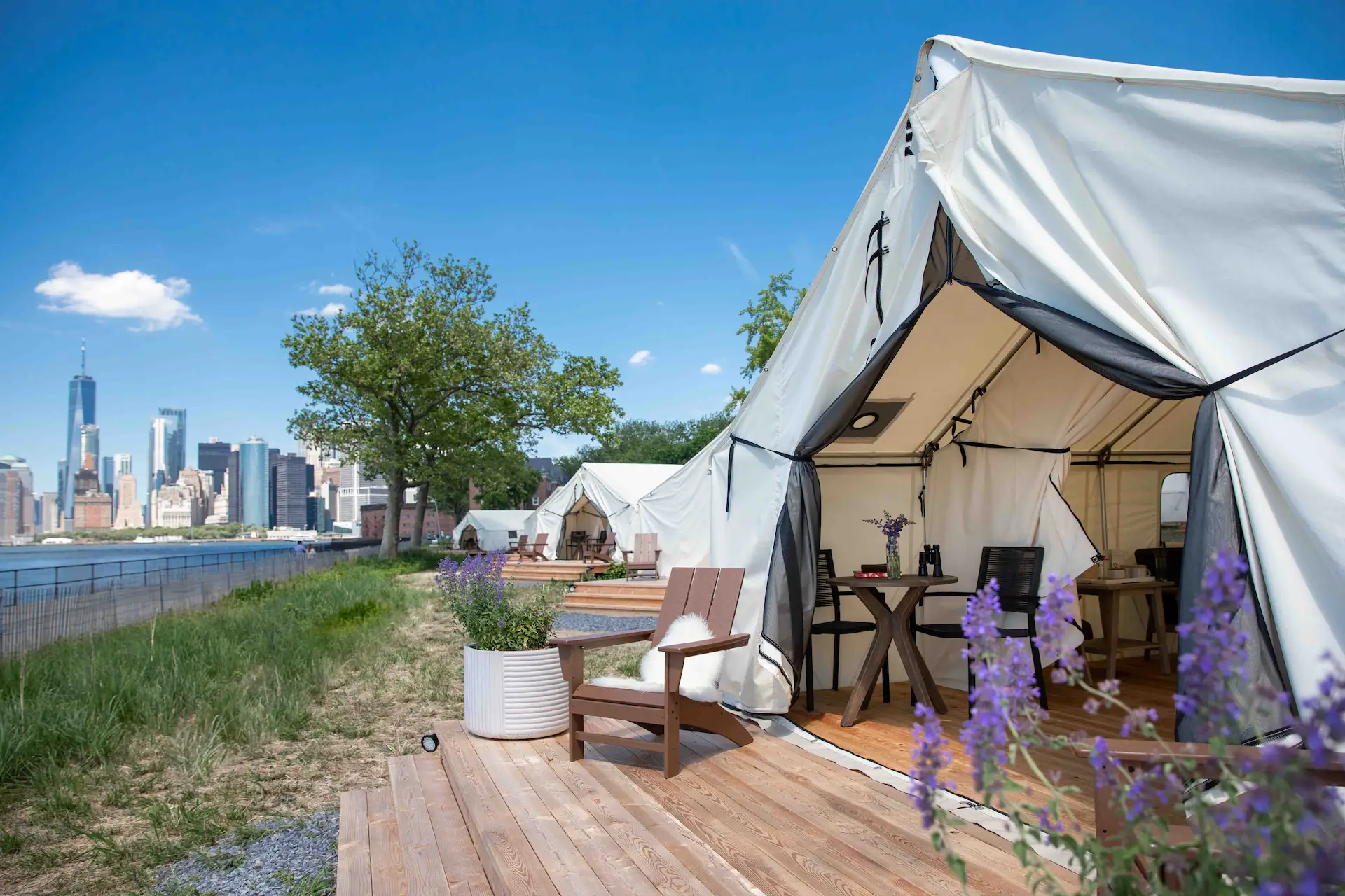 Campsite with a cityscape of New City in the background.